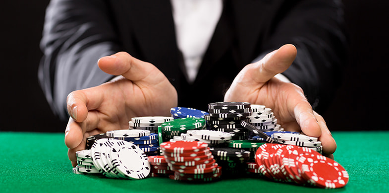 Croupier with in hand of the chips